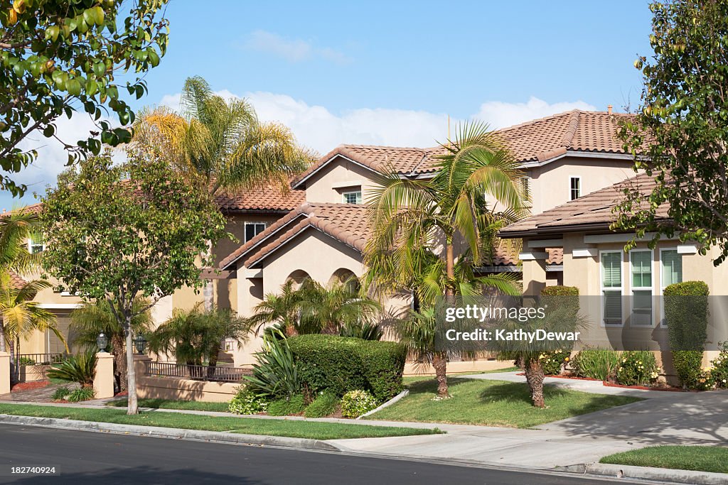 A traditional stucco home in a nice neighborhood