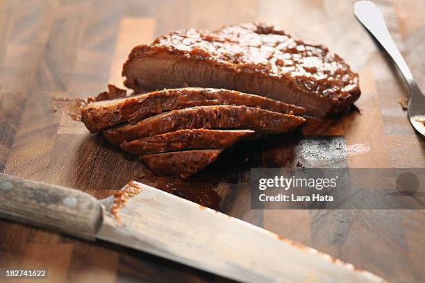 slicing brisket - brisket stock pictures, royalty-free photos & images