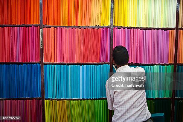 colorful fabrics - fabrics stock pictures, royalty-free photos & images