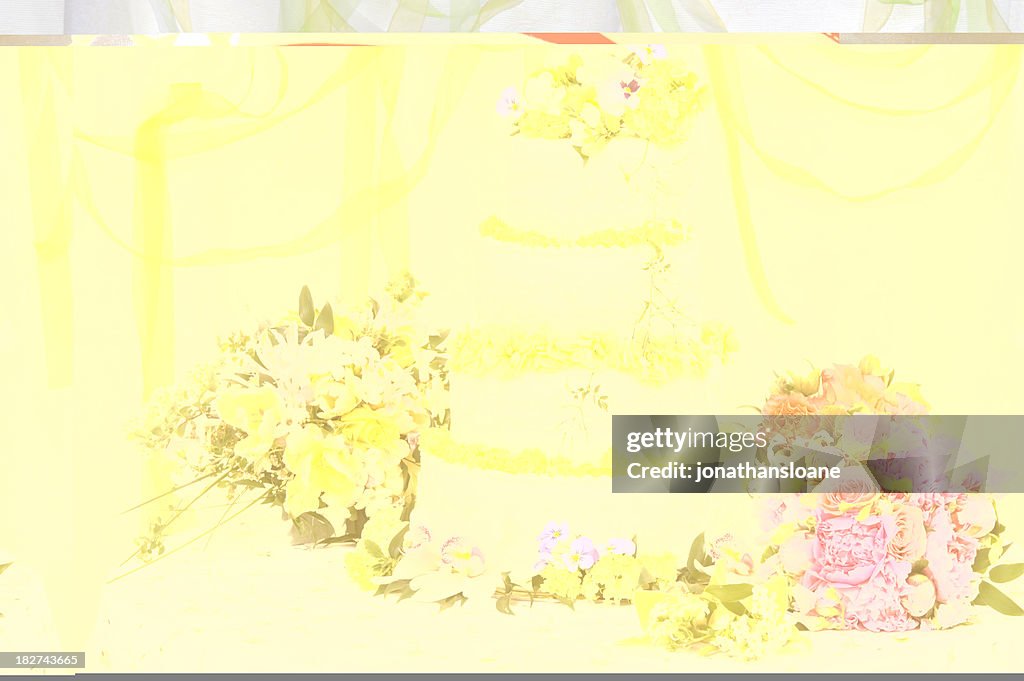 Large Wedding cake on table with flowers