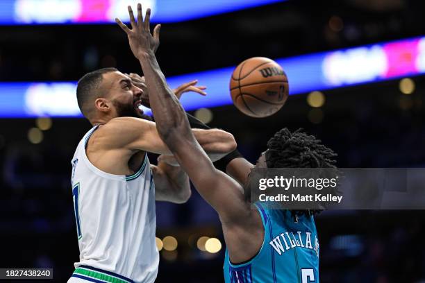 Rudy Gobert of the Minnesota Timberwolves is fouled by Mark Williams of the Charlotte Hornets during the second half of their game at Spectrum Center...