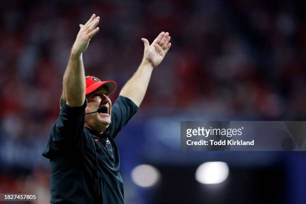 Head coach Kirby Smart of the Georgia Bulldogs reacts to a play during the fourth quarter against the Alabama Crimson Tide in the SEC Championship at...