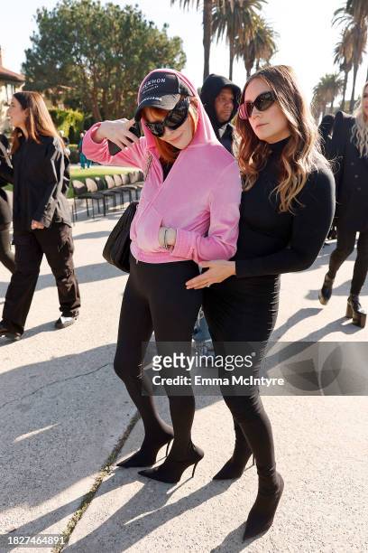 Natasha Lyonne and Billie Lourd attend the Balenciaga Fall 24 Show on December 02, 2023 in Los Angeles, California.