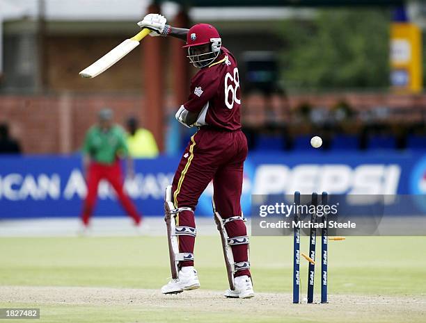 Wavell Hinds of West Indies is bowled by Martin Suji of Kenya during the ICC Cricket World Cup Group B game between Kenya and West Indies at De Beers...