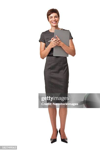 adult businesswoman holding clipboard isolated on white - businesswoman isolated stock pictures, royalty-free photos & images