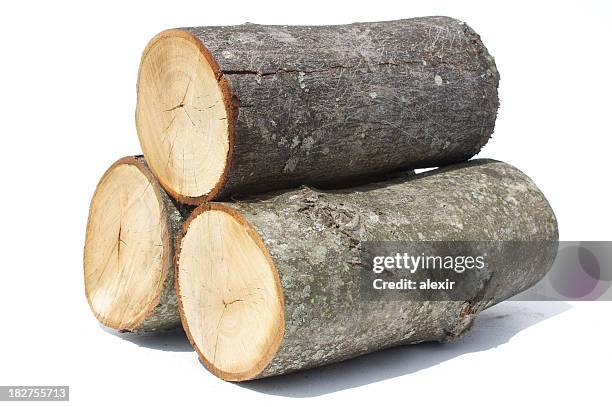 small log stack on white - firewood stock pictures, royalty-free photos & images