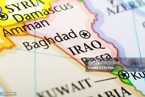 map of the country iraq in red - iraq stock pictures, royalty-free photos & images
