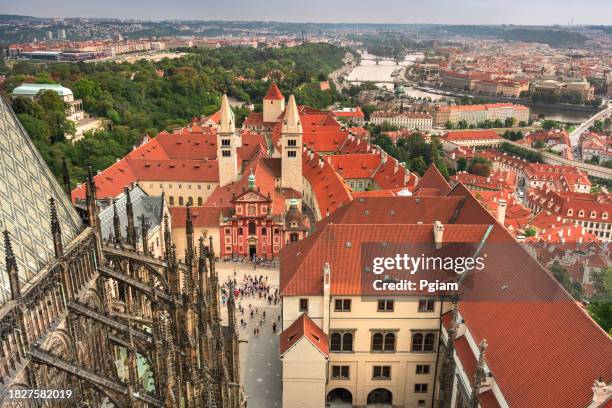 aerial view of the city of prague from st. vitus cathedral tower and prague castle czech republic - prague st vitus stock pictures, royalty-free photos & images