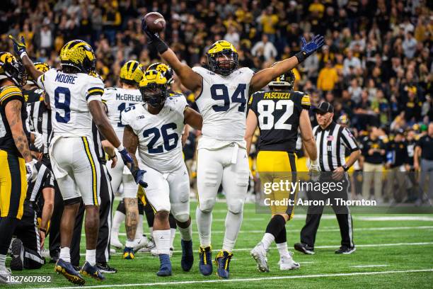 Kris Jenkins of the Michigan Wolverines reacts after recovering a fumble during the first half of the Big Ten Championship against the Iowa Hawkeyes...