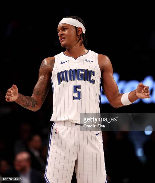 Paolo Banchero of the Orlando Magic reacts in the fourth quarter against the Brooklyn Nets at Barclays Center on December 02, 2023 in New York City....