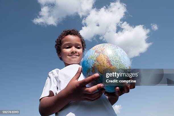 cosmopolitan child - child globe stockfoto's en -beelden