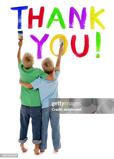 boys painting a thank you sign on white - blonde hair rear white background stock pictures, royalty-free photos & images