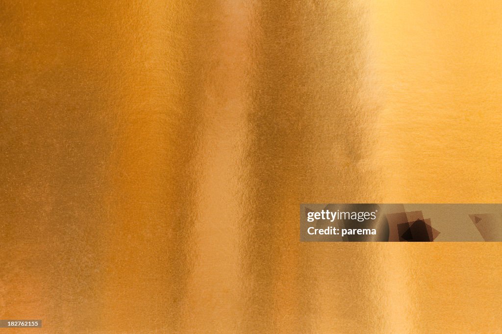 A background image of gold paper