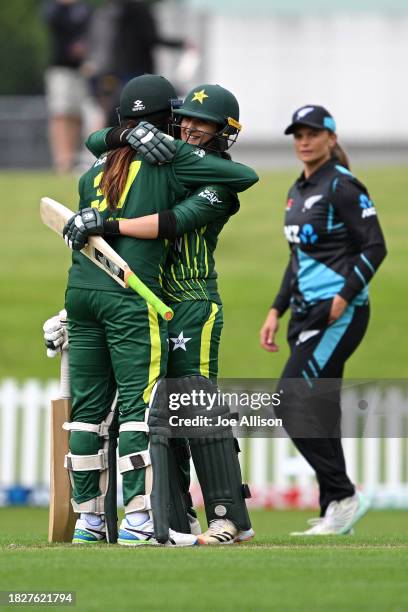 Bismah Maroof of Pakistan celebrate after winning game one of the Women's T20 International series between New Zealand and Pakistan at University of...