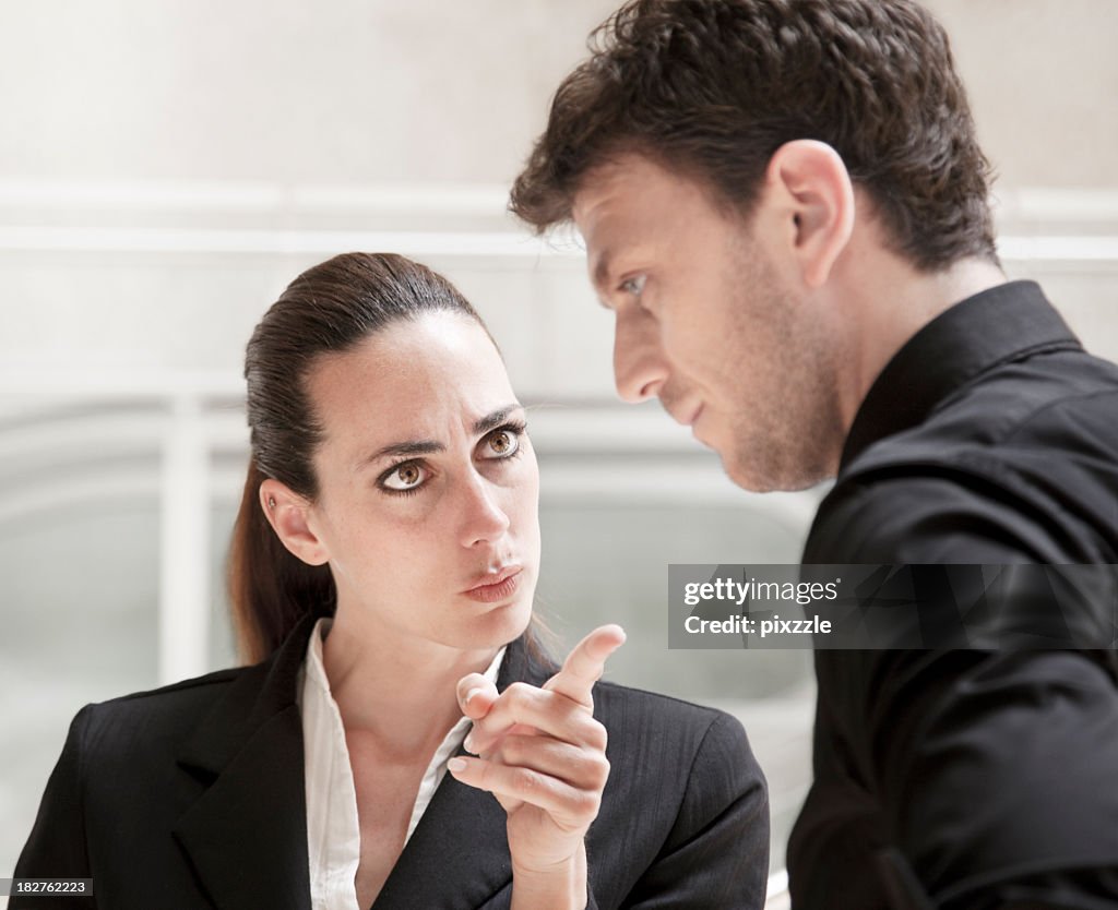 Office conflict business woman bully scolding and harrasing a worker