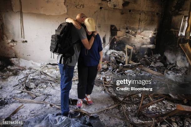 Sharone Lifschitz, visits the burnt-out home of her parents, who were kidnapped by Hamas militants on Oct. 7, in Kibbutz Nir Oz, Israel, on...