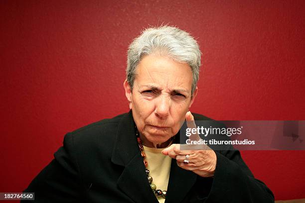 silver grey haired woman disciplining you - criticised stock pictures, royalty-free photos & images