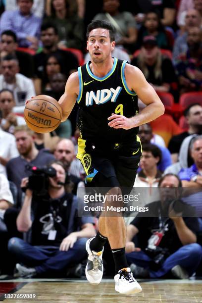 McConnell of the Indiana Pacers dribbles the ball against the Miami Heat during the fourth quarter of the game at Kaseya Center on December 02, 2023...