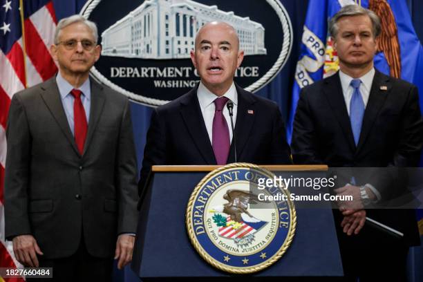 Homeland Security Secretary Alejandro Mayorkas speaks alongside U.S. Attorney General Merrick Garland and FBI Director Christopher Wray during a...