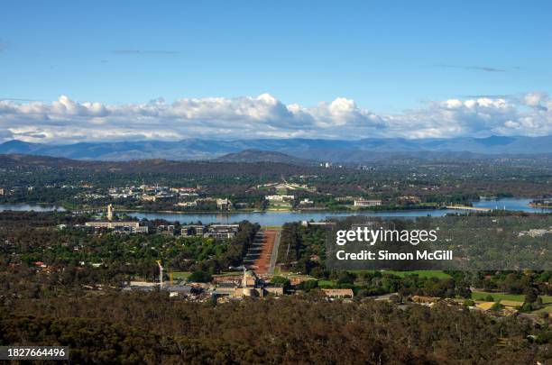 view from the lookout on mount ainslie down anzac parade to lake burley griffin and the parliamentary triangle, canberra, australian capital territory, australia - lake burley griffin stock pictures, royalty-free photos & images