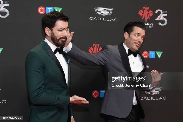 Co-Hosts Drew Scott and Jonathan Scott attend the Canada's Walk of Fame 25th Anniversary Celebration at Metro Toronto Convention Centre on December...