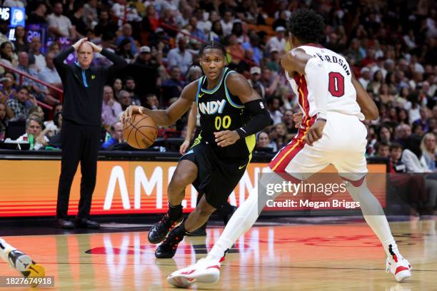 Bennedict Mathurin of the Indiana Pacers drives against Josh Richardson of the Miami Heat during the fourth quarter of the game at Kaseya Center on...