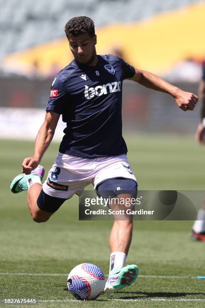 Zinédine Machach of Melbourne Victory warming up prior to play during the A-League Men round six match between Central Coast Mariners and Melbourne...