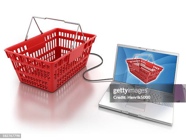 shopping basket connected to laptop - isolated with clipping path - virtual auction stock pictures, royalty-free photos & images