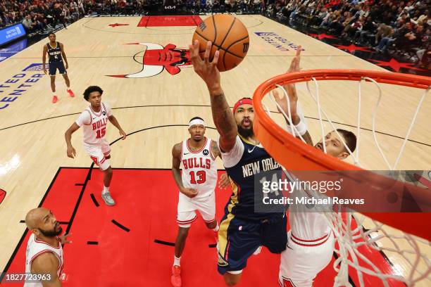 Brandon Ingram of the New Orleans Pelicans goes up for a layup against Nikola Vucevic of the Chicago Bulls during the second half at the United...