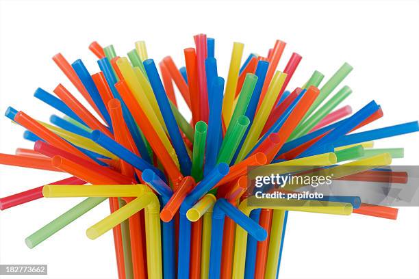 tight grouping of colorful straws - drinking straw stock pictures, royalty-free photos & images