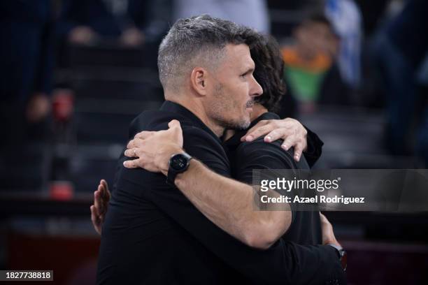 Fernando Ortíz, coach of Monterrey hugs with Gustavo Da Silva, coach of San Luis, prior the quarterfinals second leg match between Monterrey and...