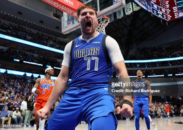 Luka Doncic of the Dallas Mavericks reacts after a basket in the fourth quarter against the Oklahoma City Thunder at American Airlines Center on...
