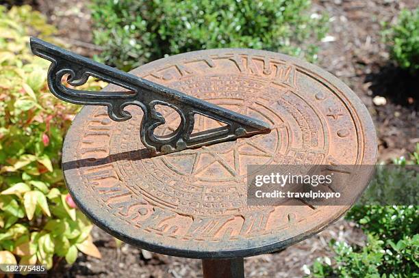 sun dial profile - ancient sundials stock pictures, royalty-free photos & images