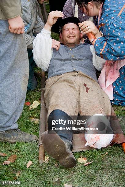 confederate soldier screaming in pain - reenactment stock pictures, royalty-free photos & images