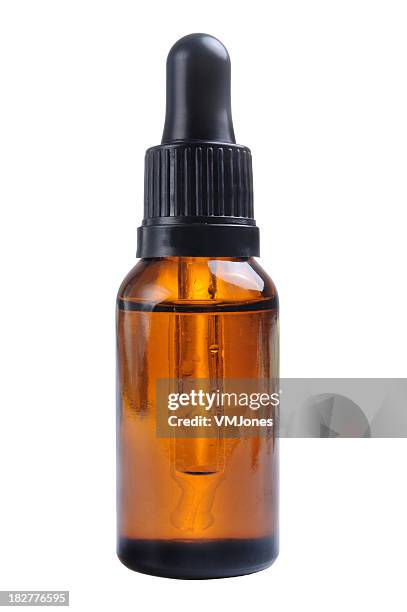 tintura de opio botella aislado - botella con gotero fotografías e imágenes de stock