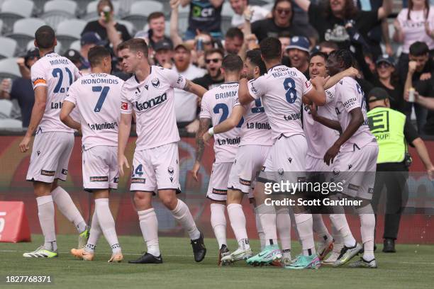 Melbourne Vicctory players celebrate the goal of Nishan Velupillay during the A-League Men round six match between Central Coast Mariners and...