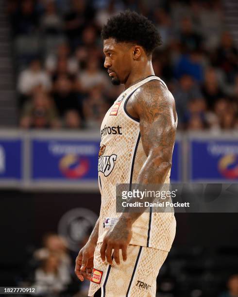 Patrick Miller of the Taipans celebrates on the final buzzer after winning the round nine NBL match between Melbourne United and Cairns Taipans at...