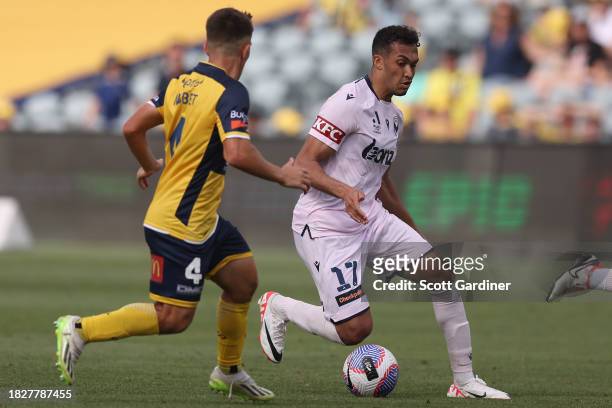 Nishan Velupillay of Melbourne Victory with the ball during the A-League Men round six match between Central Coast Mariners and Melbourne Victory at...