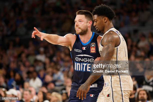 Matthew Dellavedova of United and Patrick Miller of the Taipans compete during the round nine NBL match between Melbourne United and Cairns Taipans...