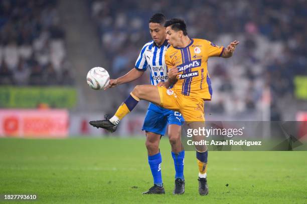 Luis Romo of Monterrey fights for the ball with Rodrigo Dourado of San Luis during the quarterfinals second leg match between Monterrey and Atletico...