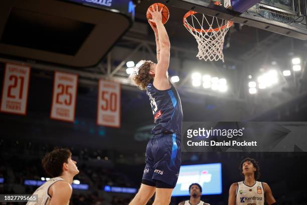Luke Travers of United dunks during the round nine NBL match between Melbourne United and Cairns Taipans at John Cain Arena, on December 03 in...