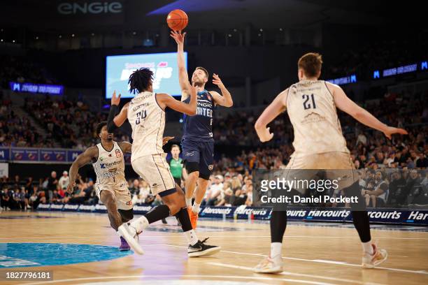 Matthew Dellavedova of United throws up an alley-oop pass during the round nine NBL match between Melbourne United and Cairns Taipans at John Cain...
