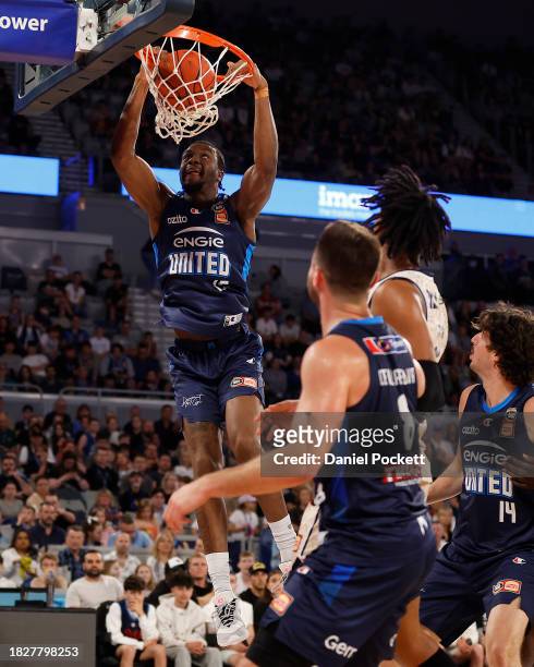 Ariel Hukporti of United dunks during the round nine NBL match between Melbourne United and Cairns Taipans at John Cain Arena, on December 03 in...