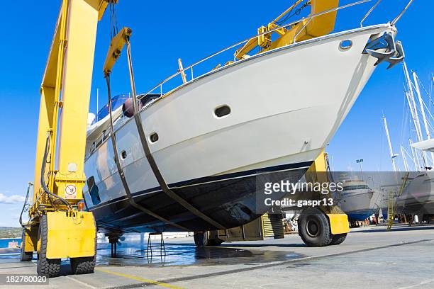 seasonal mending - boat engine stock pictures, royalty-free photos & images