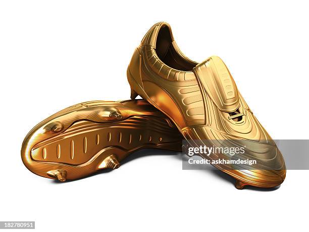 gold football schuhe - goldene schuhe stock-fotos und bilder
