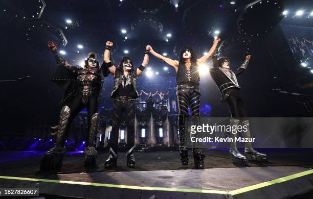 Gene Simmons, Eric Singer, Paul Stanley and Tommy Thayer of KISS take final bow during the final show of KISS: End of the Road World Tour at Madison...
