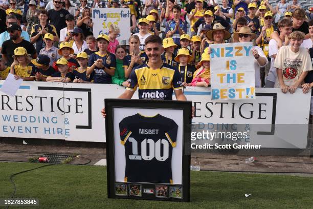 Joshua Nisbet of the Mariners celebrates his 100th A-Leauge game during the A-League Men round six match between Central Coast Mariners and Melbourne...