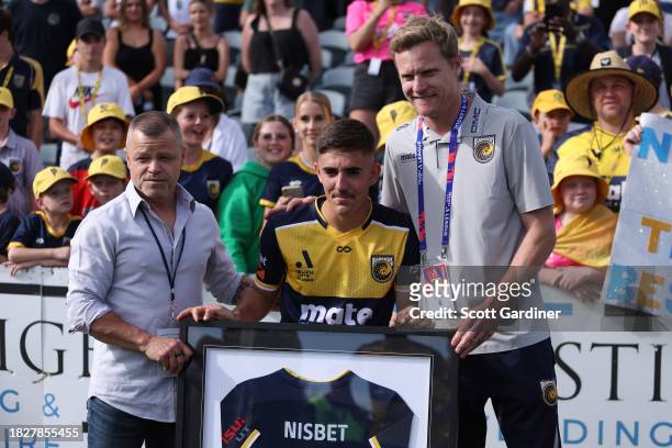 Joshua Nisbet of the Mariners with Mariners Chairman Richard Peil and Mariners Staff Matt Simon during the A-League Men round six match between...