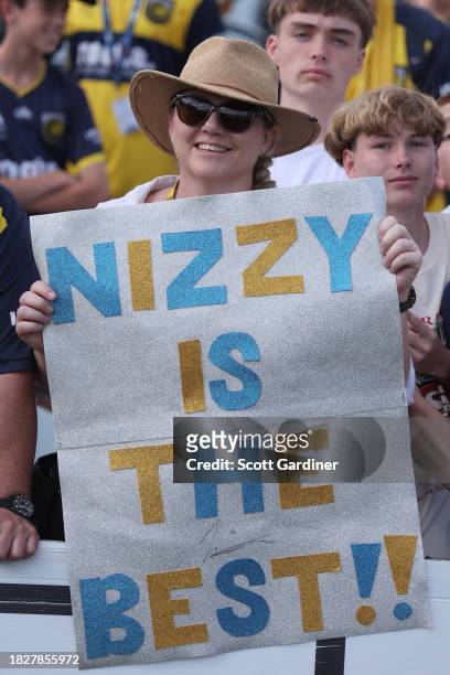 Mariners fan with a Joshua Nisbet sign during the A-League Men round six match between Central Coast Mariners and Melbourne Victory at Industree...