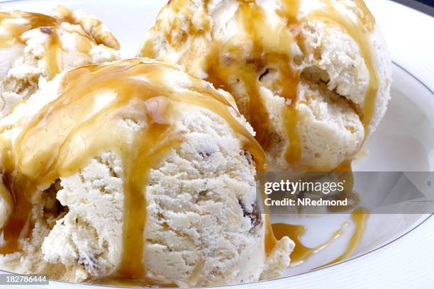 a bowl of ice cream with sauce - caramel stock pictures, royalty-free photos & images